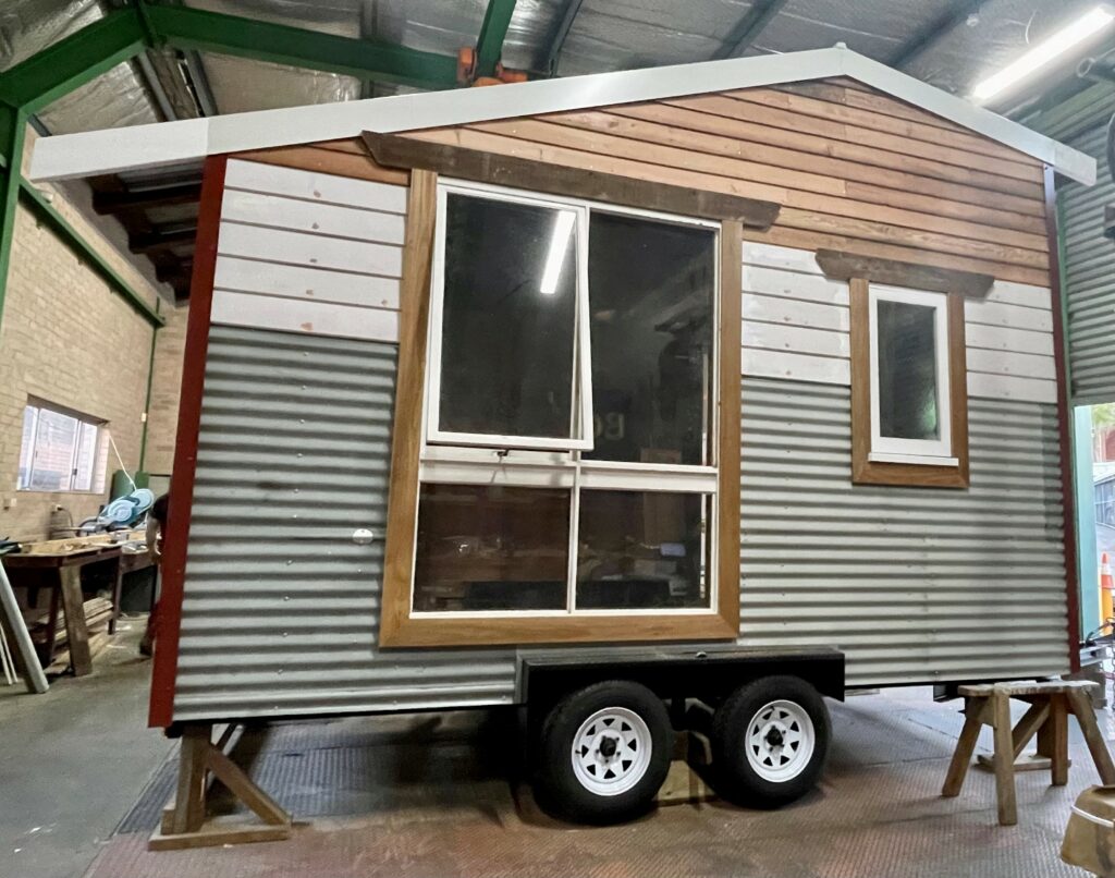 Back view image of July 2023 Tiny House- windows