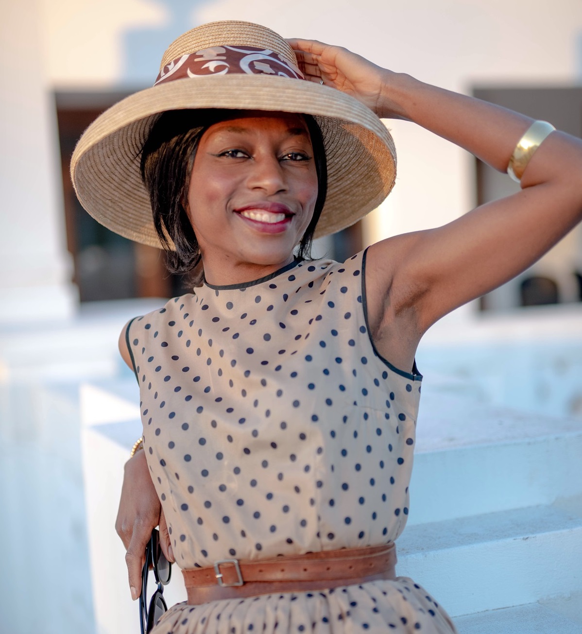 Nina Gbor in hat and polka dot dress